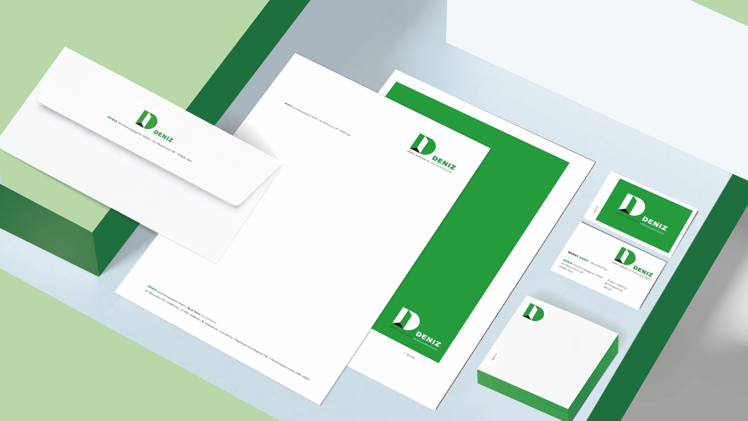 Geschäftsausstattung mit Briefpapier, Visitenkarten und Umschlägen der DENIZ Versicherungsagentur – Corporate Design Finanzdienstleister von Corporate Designer Freelancer.